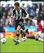 Arsenal's Patrick Vieira can't stop Laurent Robert in full flight