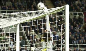 David Seaman denies Craig Bellamy a deflected winner in injury-time