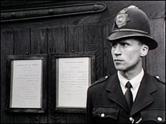 Photo of a policeman outside Holloway Prison