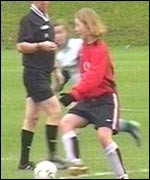 Caroline Hulme playing football