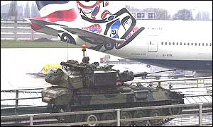 Troops patrol the airport perimeter