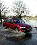 Car in flood PA