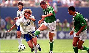 Roy Keane powers a shot towards the Italian goal at the 1994 World Cup