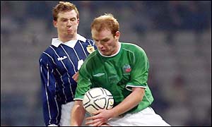 Ireland's Gary Doherty gets the better of the internationally inexperienced Stephen Caldwell