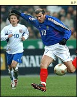 Tomas Rosicky chases France's Zinedine Zidane