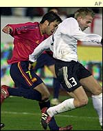 Spain's Raul chases Germany's Tobias Rau 