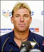 Shane Warne speaks to the press after the news broke
