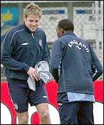 James Beattie shares a joke with Aston Villa's Darius Vassell