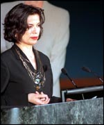 Addressing a UN coference on violence against women in 1999