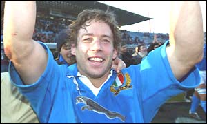 Veteran Italian fly-half Diego Dominguez celebrates a famous win over Wales