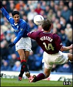 Arteta squeezes a shot in past Andy Webster