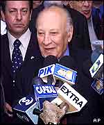 President Glafcos Clerides speaks to the media after casting his vote