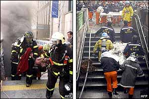 Firefighters bring out casualties from the Daegu station