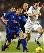 Leicester's Gerry Taggert holds off the challenge of Svetoslav Todorov