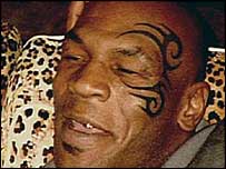 Mike Tyson shows off his new tattoo