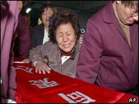 Grieving relatives in Daegu