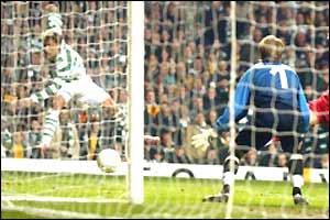 Stilian Petrov scores Celtic's third into the near corner from a tight angle