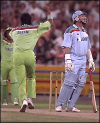 Wasim Akram celebrates the wicket of Ian Botham in the 1992 World Cup in Melbourne