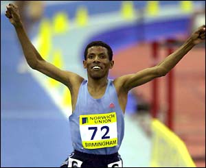 Ethiopia's Haile Gebrselassie celebrates victory in the two mile