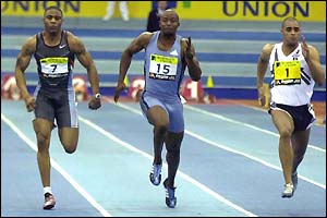 Great Britain's Mark Lewis-Francis, the American Ramon Clay and Jason Gardener race for the line in the 60m final