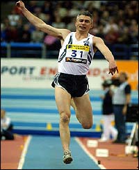 Triple jumper Jonathan Edwards sets off on a jump