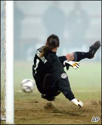 Lokomotiv Moscow's goalkeeper Sergei Ovchinnikov fails to stop AC Milan taking the lead