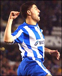 Diego Tristan punches the air with delight after scoring for Deportivo La Coruna