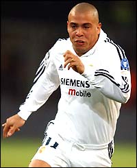 Ronaldo concentrates as he runs with the ball for Real Madrid