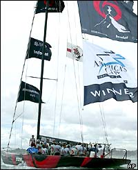 Alinghi heads for harbour flying the winner's flag