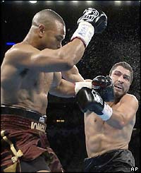 Roy Jones Jnr lands a left hook in the face of John Ruiz