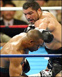 John Ruiz lands a left hand on Roy Jones Jnr 