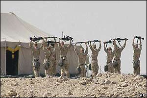 Soldiers train with their rifles