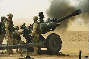 US soldiers practise their howitzers