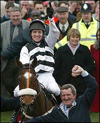 Jockey Barry Geraghty celebrates after Moscow Flyer's win 