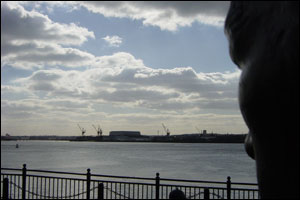 Bronze statue on the banks of the Mersey