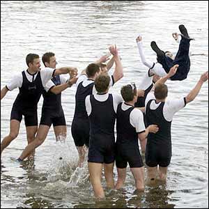 Oxford cox Peter Hackworth is thrown into the water as his crew celebrate