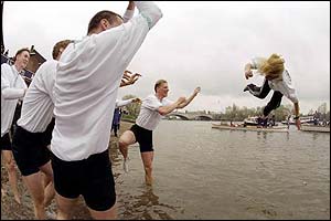 Winning Cambridge cox Vian Sharif is drenched