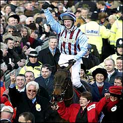 Horse and rider are hailed by the famously fanatical Cheltenham crowd