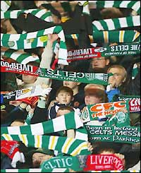 Fans of both teams join in song