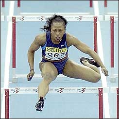 Gail Devers wins her place in the final of the women's 60m hurdles in style 