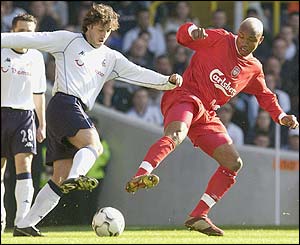 Mauricio Taricco tackles underfire Liverpool star El Hadji Diouf