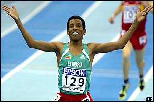 Haile Gebrselassie crosses the line to win the men's 300m