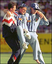 Gough is carried from the field, injured