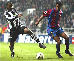 Titus Bramble slips as he tries to track back for Newcastle