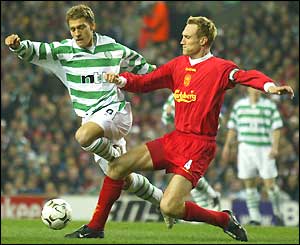 Stilian Petrov is tackled by Liverpool defender Sami Hyypia
