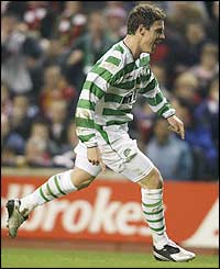 Celtic midfielder Alan Thompson celebrates his goal 