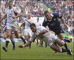 Jason Robinson scores England's third try in the 64th minute