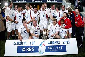 England players celebrate with the Calcutta Cup after their victory against Scotland 