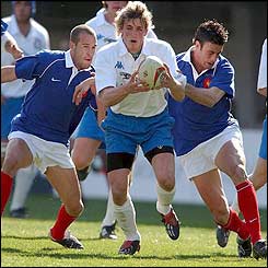 Italy's Mirco Bergamasco breaks through the French defence 