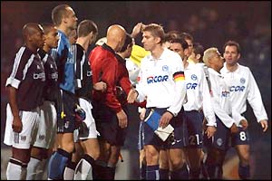 Fulham's players shake hands with their Hertha Berlin counterparts in the Uefa Cup third round